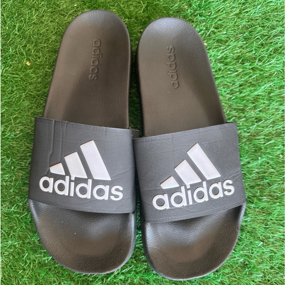 Adidas slides.